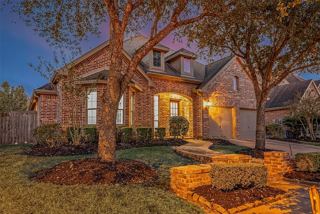 18306 S Austin Shore Dr, Cypress, TX 77433 - view of front facade with brick siding, concrete driveway, and a garage