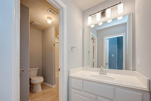 18306 S Austin Shore Dr, Cypress, TX 77433 - bathroom featuring toilet, tile patterned floors, vanity, and  shower combination