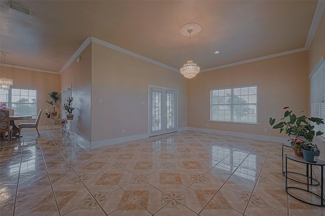 1241 Terrazas Ln, Sealy, TX 77474 - empty room featuring a chandelier, baseboards, and crown molding