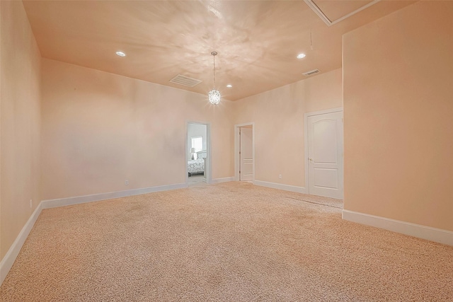 1241 Terrazas Ln, Sealy, TX 77474 - spare room featuring attic access, light carpet, recessed lighting, and baseboards