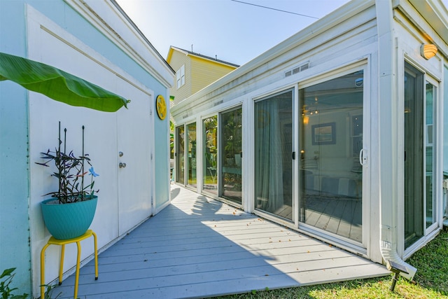 1902 Bayou Shore Dr, Galveston, TX 77551 - wooden terrace featuring a sunroom