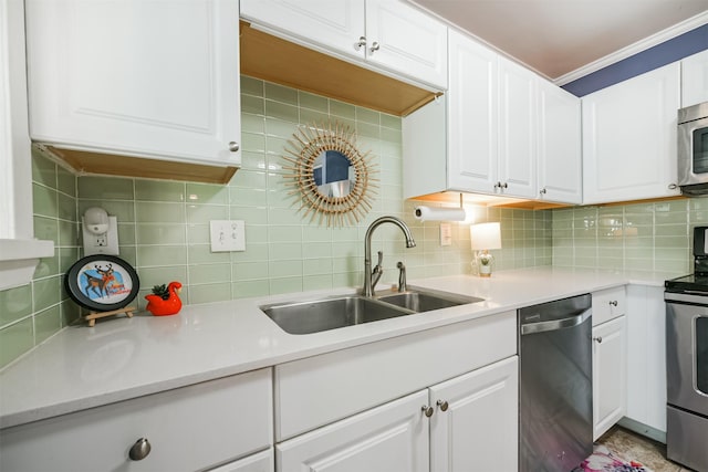 1902 Bayou Shore Dr, Galveston, TX 77551 - kitchen with appliances with stainless steel finishes, a sink, backsplash, and crown molding