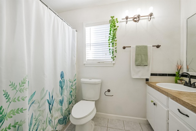 1902 Bayou Shore Dr, Galveston, TX 77551 - bathroom featuring vanity, toilet, tile patterned floors, baseboards, and a shower with curtain
