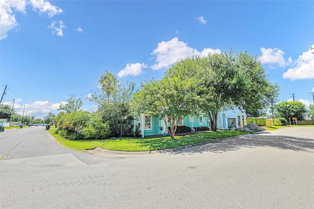 1902 Bayou Shore Dr, Galveston, TX 77551 - view of front facade with a front lawn