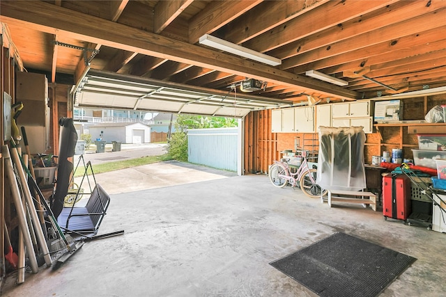 1902 Bayou Shore Dr, Galveston, TX 77551 - garage featuring a garage door opener