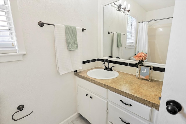 1902 Bayou Shore Dr, Galveston, TX 77551 - full bathroom with vanity and curtained shower