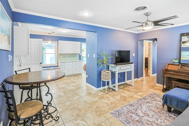 1902 Bayou Shore Dr, Galveston, TX 77551 - living area with ornamental molding, ceiling fan, and light tile patterned floors