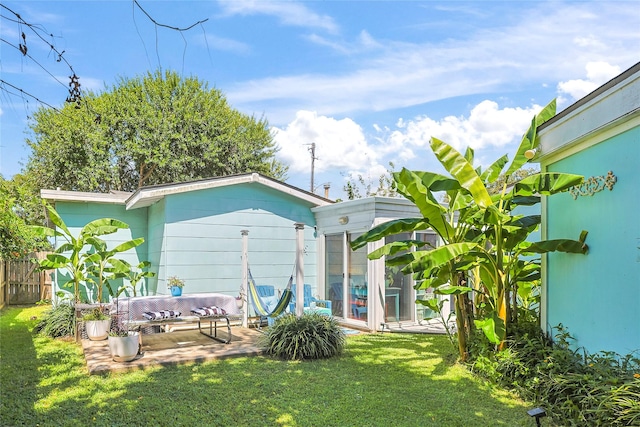 1902 Bayou Shore Dr, Galveston, TX 77551 - rear view of house featuring a patio