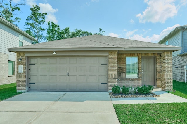 16953 Rich Pines Dr, Conroe, TX 77302 - view of front of home featuring an attached garage, brick siding, driveway, and a shingled roof