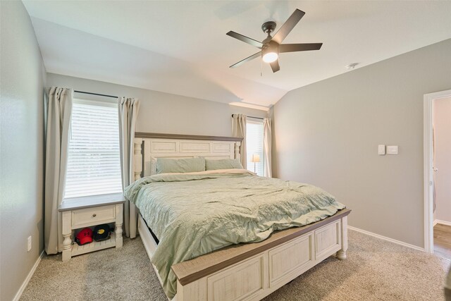 16953 Rich Pines Dr, Conroe, TX 77302 - bedroom featuring light carpet, vaulted ceiling, baseboards, and ceiling fan