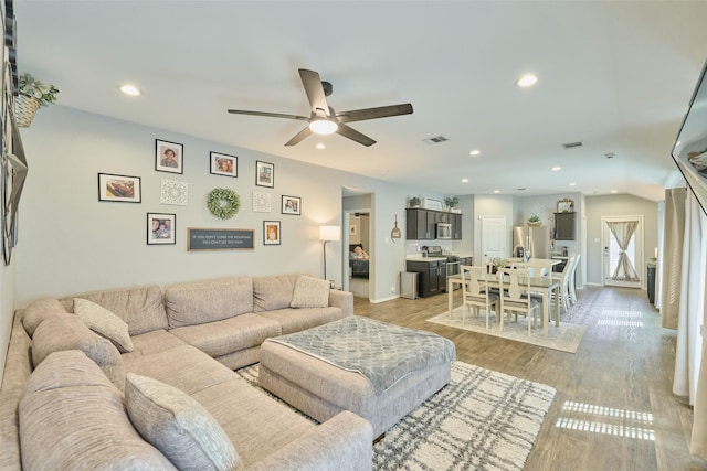 16953 Rich Pines Dr, Conroe, TX 77302 - living area with a ceiling fan, recessed lighting, light wood-style flooring, and baseboards