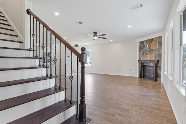 1214 Sabine Brook Way, Houston, TX 77073 - stairs featuring ceiling fan, a tile fireplace, wood finished floors, recessed lighting, and baseboards