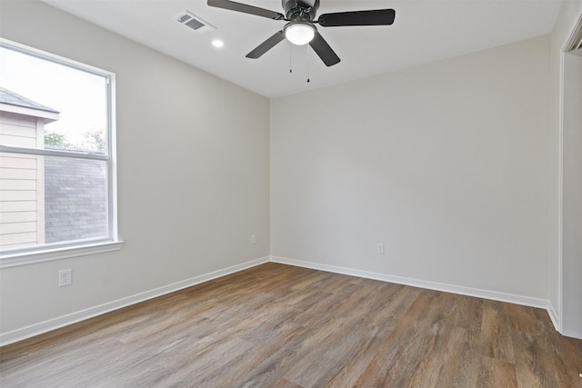 1214 Sabine Brook Way, Houston, TX 77073 - spare room with wood finished floors, a ceiling fan, baseboards, and recessed lighting