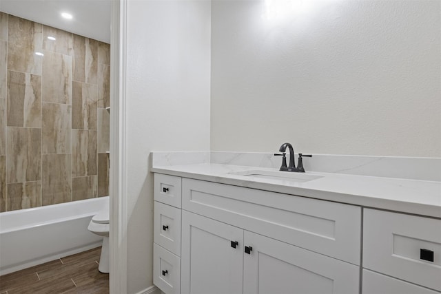 1214 Sabine Brook Way, Houston, TX 77073 - full bathroom featuring toilet, wood finished floors, vanity, recessed lighting, and tub / shower combination