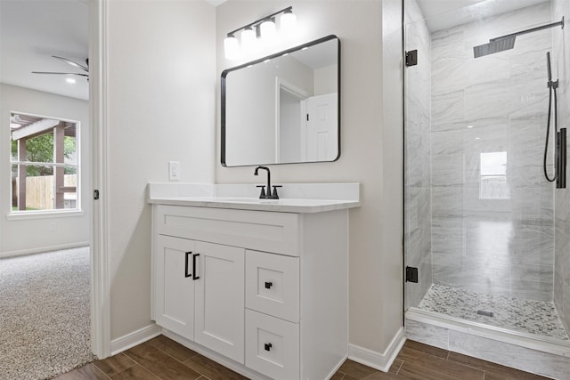 1214 Sabine Brook Way, Houston, TX 77073 - bathroom featuring a stall shower, baseboards, and vanity