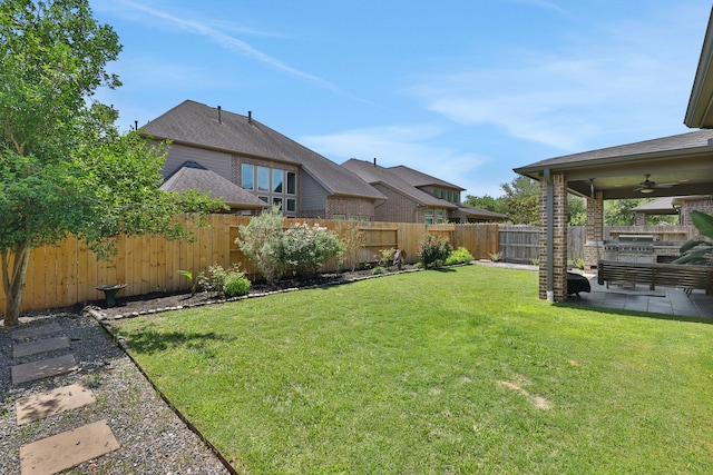 6706 Miller Shadow Ln, Sugar Land, TX 77479 - view of yard featuring a ceiling fan and a patio area