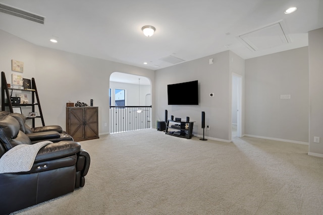 6706 Miller Shadow Ln, Sugar Land, TX 77479 - living area featuring carpet flooring, baseboards, recessed lighting, and arched walkways