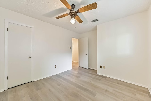 3915 Rosemont Dr, La Porte, TX 77571 - unfurnished bedroom with light wood-type flooring, baseboards, and a ceiling fan