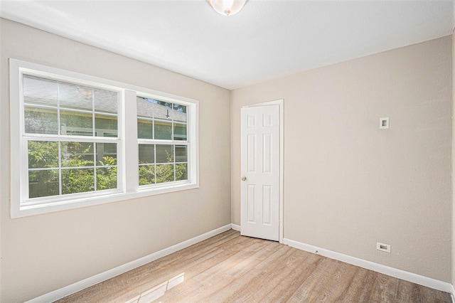 7306 Lakewood Dr, Houston, TX 77016 - unfurnished room with baseboards and light wood finished floors