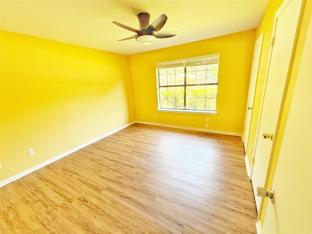 803 Wolley Cir, Crockett, TX 75835 - unfurnished bedroom with light wood-type flooring, baseboards, and a ceiling fan