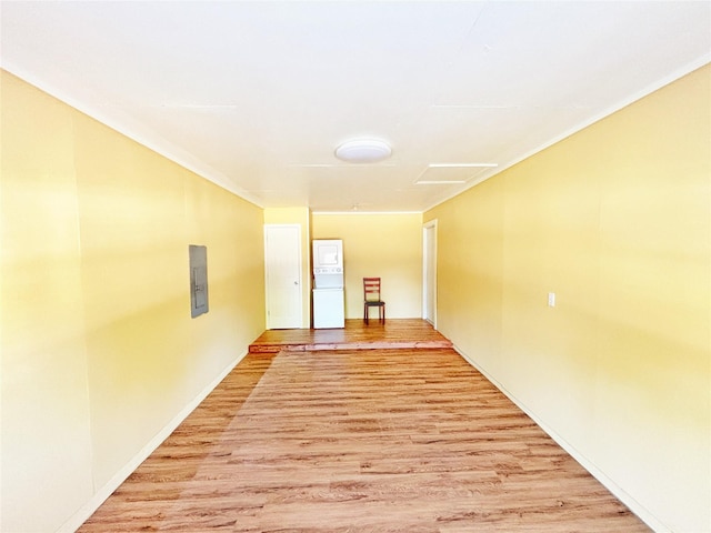 803 Wolley Cir, Crockett, TX 75835 - hall featuring light wood-style flooring, electric panel, and baseboards
