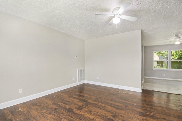 2705 Camille St, Pasadena, TX 77506 - unfurnished room featuring ceiling fan, a textured ceiling, wood-type flooring, and baseboards