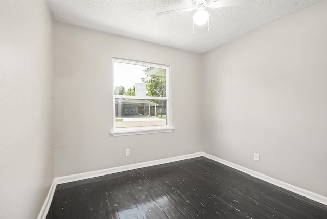 2705 Camille St, Pasadena, TX 77506 - unfurnished room featuring dark wood-style flooring, baseboards, a textured ceiling, and a ceiling fan
