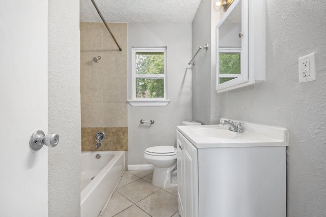 2705 Camille St, Pasadena, TX 77506 - bathroom featuring tile patterned flooring, a textured ceiling, toilet, vanity, and  shower combination