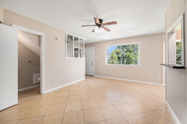 6046 W Airport Blvd, Houston, TX 77035 - spare room with a ceiling fan, light tile patterned floors, baseboards, and recessed lighting
