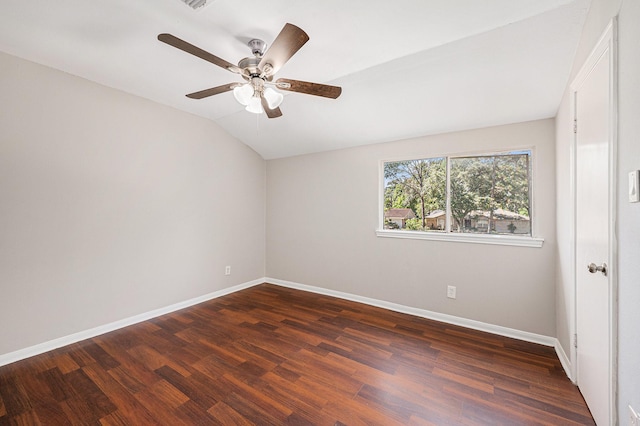 6046 W Airport Blvd, Houston, TX 77035 - spare room with dark wood-type flooring, vaulted ceiling, baseboards, and ceiling fan