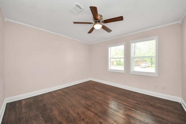 129 E 6th St, Deer Park, TX 77536 - spare room with baseboards, dark wood-style floors, ceiling fan, and ornamental molding