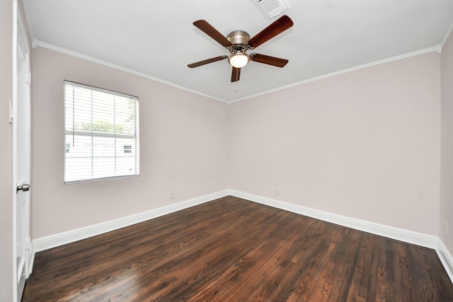 129 E 6th St, Deer Park, TX 77536 - empty room featuring baseboards, dark wood-style floors, ceiling fan, and crown molding