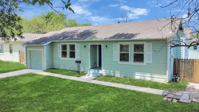 129 E 6th St, Deer Park, TX 77536 - view of front of house with an attached garage, roof with shingles, and driveway