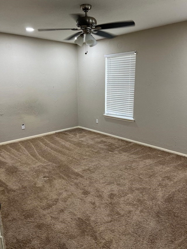 1506 Grand Valley Dr, Houston, TX 77090 - carpeted empty room with ceiling fan and baseboards