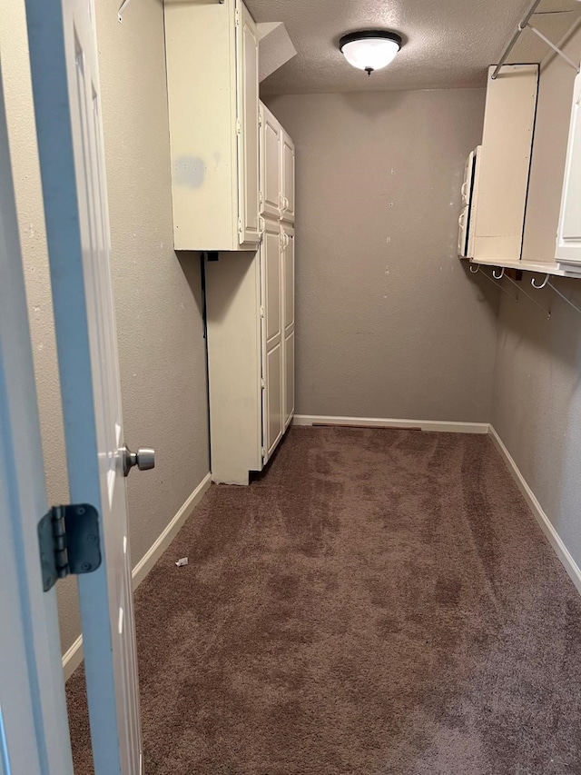 1506 Grand Valley Dr, Houston, TX 77090 - spacious closet with dark carpet