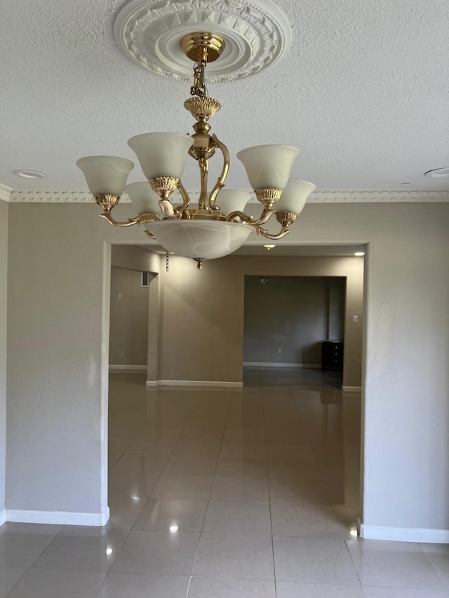 1506 Grand Valley Dr, Houston, TX 77090 - spare room with a textured ceiling, baseboards, tile patterned floors, and a chandelier