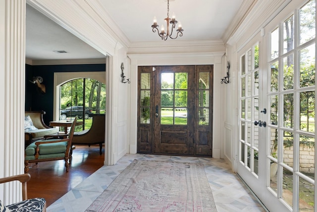 23025 Jane Rd, Tomball, TX 77377 - foyer with a chandelier, crown molding, and french doors
