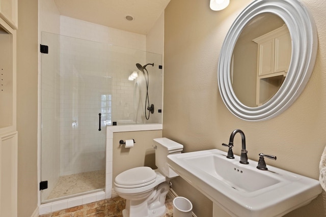 23025 Jane Rd, Tomball, TX 77377 - full bath featuring toilet, a shower stall, and a sink