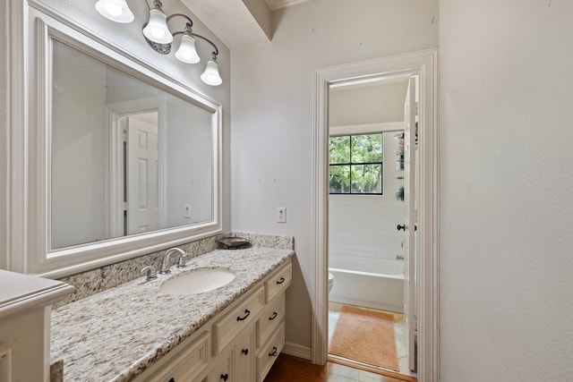 23025 Jane Rd, Tomball, TX 77377 - bathroom with vanity, a bath, and toilet