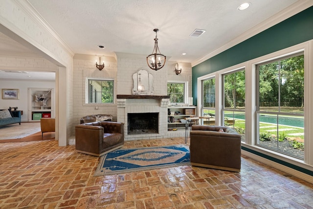 23025 Jane Rd, Tomball, TX 77377 - living room featuring brick floors, a brick fireplace, plenty of natural light, crown molding, and a textured ceiling