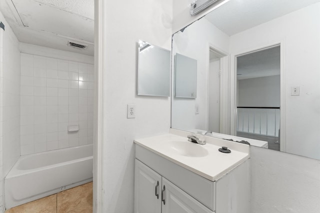 3100 Jeanetta St Unit 606, Houston, TX 77063 - bathroom featuring vanity, tile patterned flooring, and bathtub / shower combination