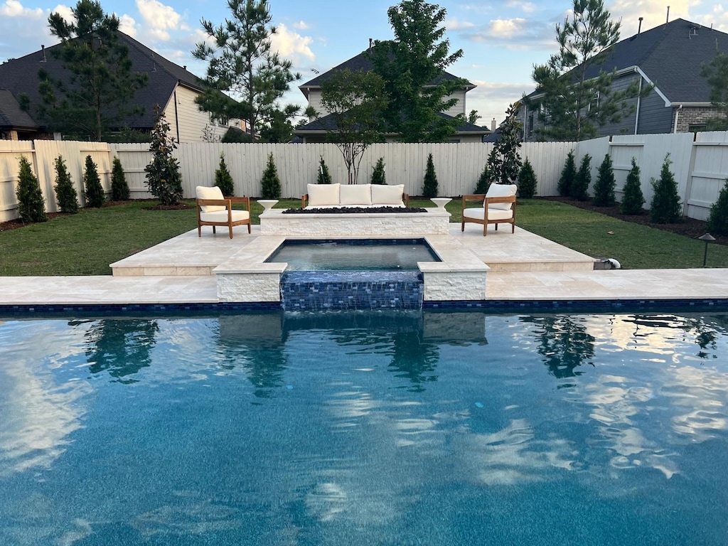9730 Migrant Hawker Ct, Conroe, TX 77385 - view of swimming pool with a patio area and a pool with connected hot tub