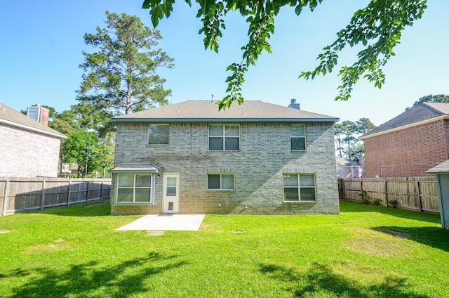 13523 Spring Ct, Tomball, TX 77375 - rear view of property featuring brick siding and a patio area