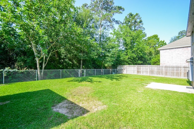 13523 Spring Ct, Tomball, TX 77375 - view of yard with a patio area