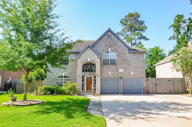 13523 Spring Ct, Tomball, TX 77375 - view of front of property featuring brick siding, a garage, and concrete driveway