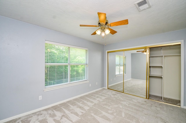 13523 Spring Ct, Tomball, TX 77375 - unfurnished bedroom featuring baseboards, carpet, a closet, and ceiling fan