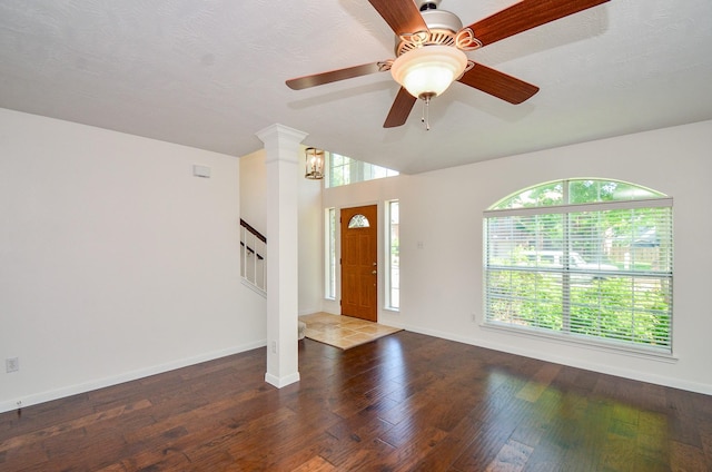 13523 Spring Ct, Tomball, TX 77375 - foyer entrance featuring stairs, wood finished floors, baseboards, and ceiling fan