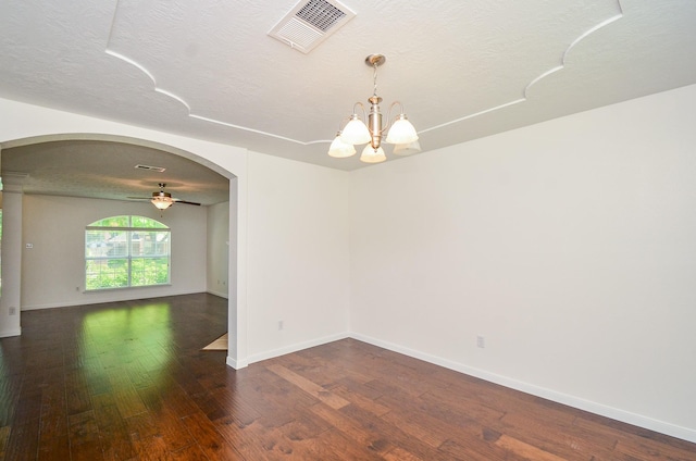 13523 Spring Ct, Tomball, TX 77375 - empty room featuring arched walkways, wood finished floors, ceiling fan, baseboards, and a textured ceiling