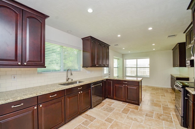 13523 Spring Ct, Tomball, TX 77375 - kitchen featuring dishwasher, a sink, electric range, healthy amount of natural light, and recessed lighting
