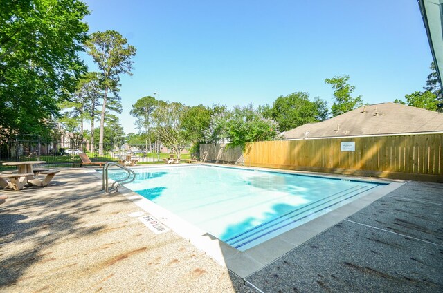 13523 Spring Ct, Tomball, TX 77375 - community pool featuring fence and a patio